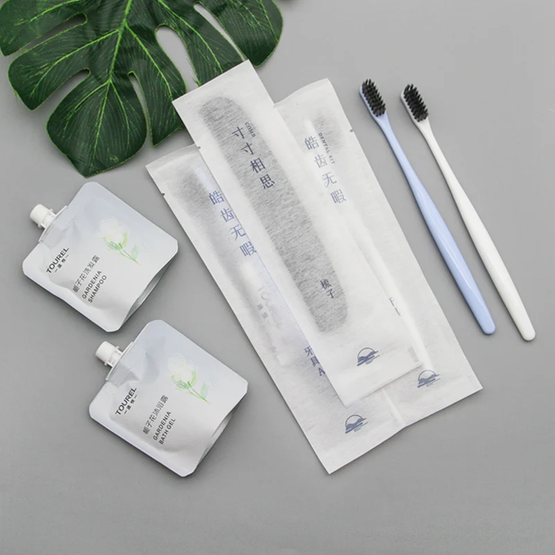 9 Pi&egrave;ces Articles de toilette jetables pour h&ocirc;tel Accessoires de salle de bain Brosse &agrave; dents Savon Shampoing Peigne Ensemble d'articles de toilette &eacute;cologiques pour h&ocirc;tel