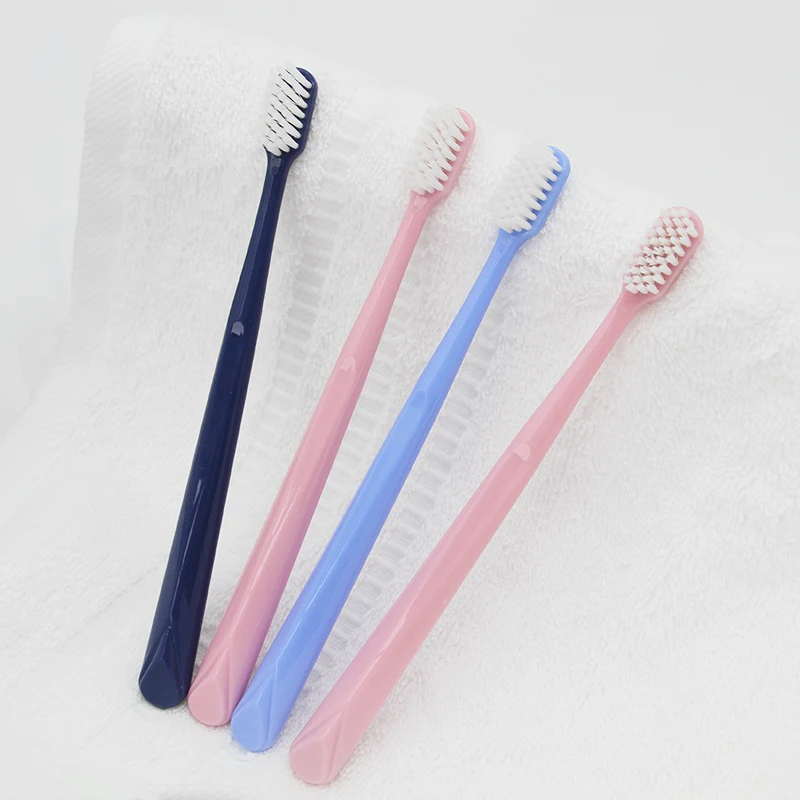 Brosse à dents d'hôtel avec logo personnalisé et brosses à dents jetables à brins souples pour équipements hôteliers