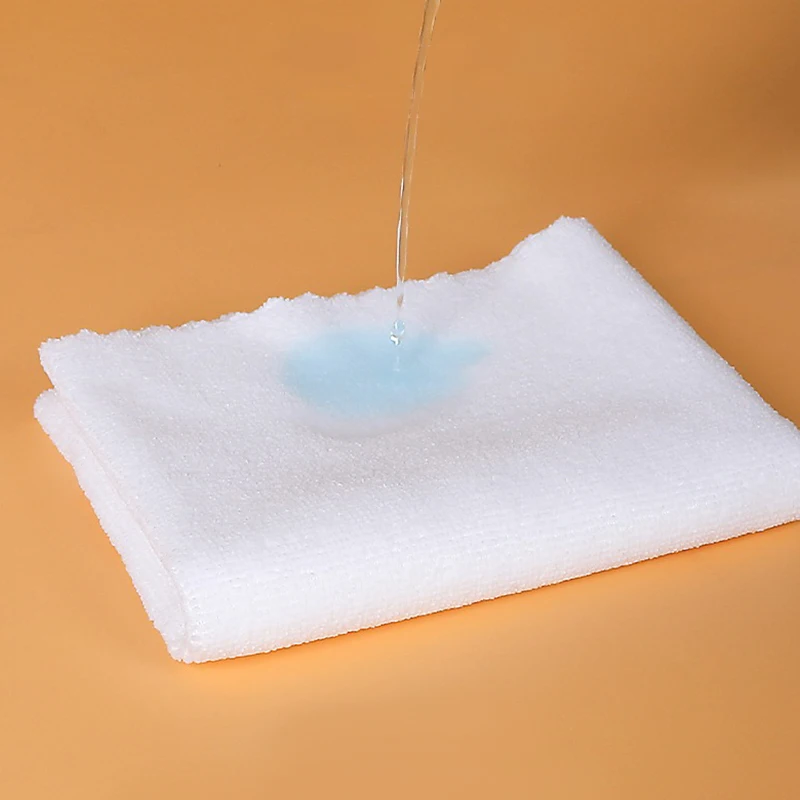 Serviette de bain jetable personnalisée en microfibre tricotée chaîne pour hôtel, visage, salon, manucure, nettoyage, compressée, super absorbante, écologique, unie