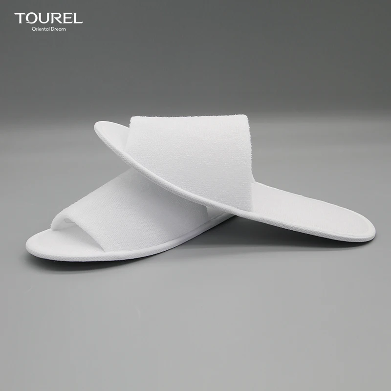 Serviette éponge en molleton corail exclusive, chausson d'hôtel portable biodégradable doux recyclable brodé à bout ouvert unisexe spa OEM