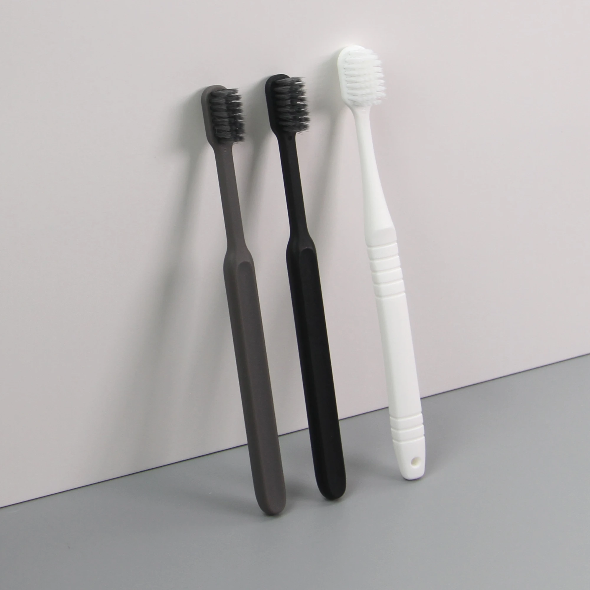 Nouveau design pratique brosse à dents jetable pour les clients d'hôtel, hygiène douce portable, soins de nettoyage, brosse à dents à perles éclatantes