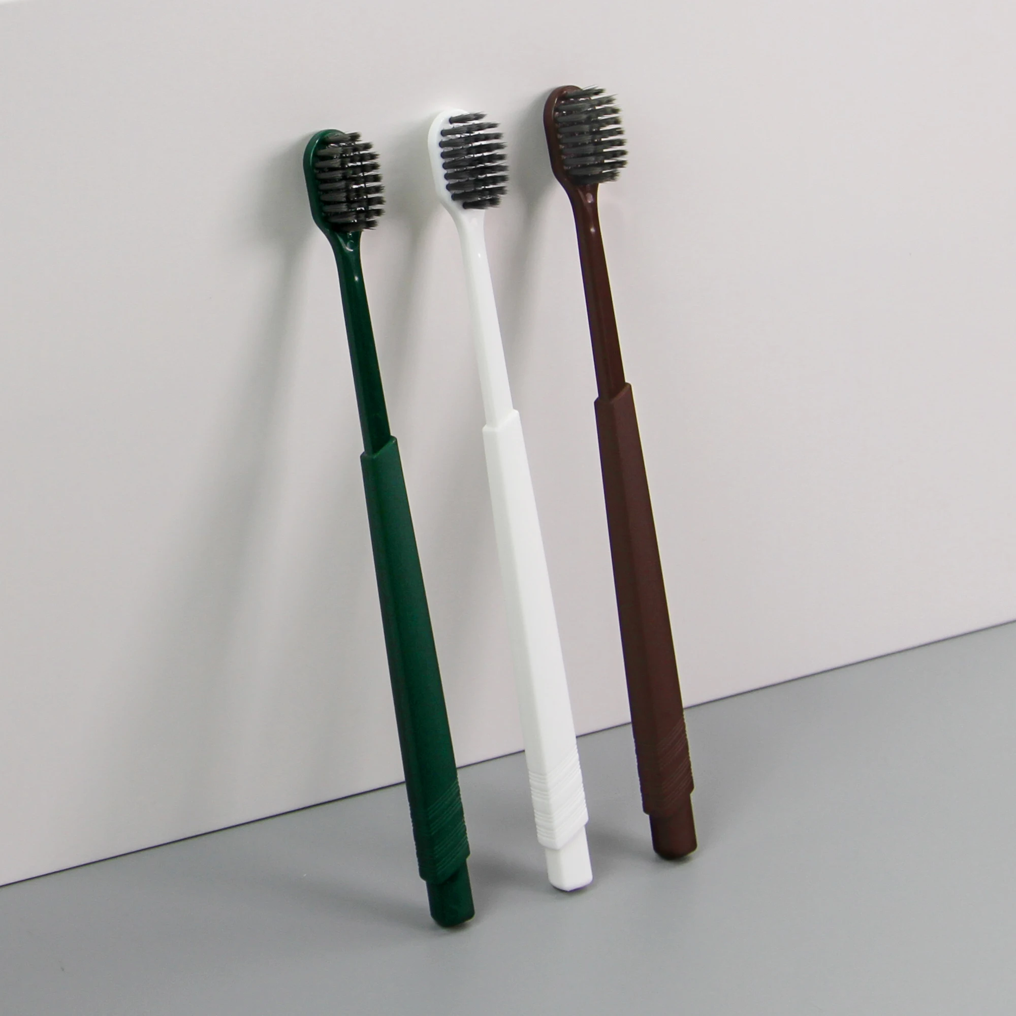 Nouveau design pratique brosse à dents jetable pour les clients d'hôtel, hygiène douce portable, soins de nettoyage, brosse à dents à perles éclatantes