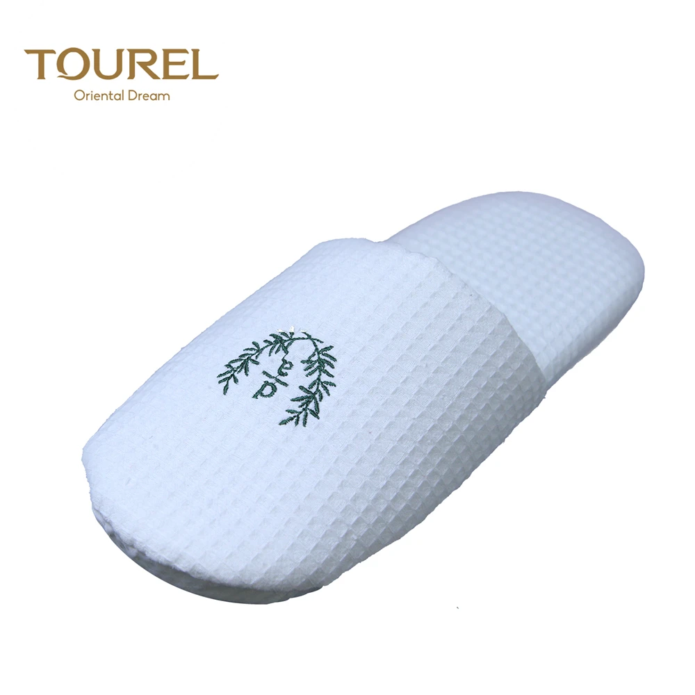 Chaussons en éponge gaufrée à bout fermé Tourel de qualité hôtelière premium avec logo brodé