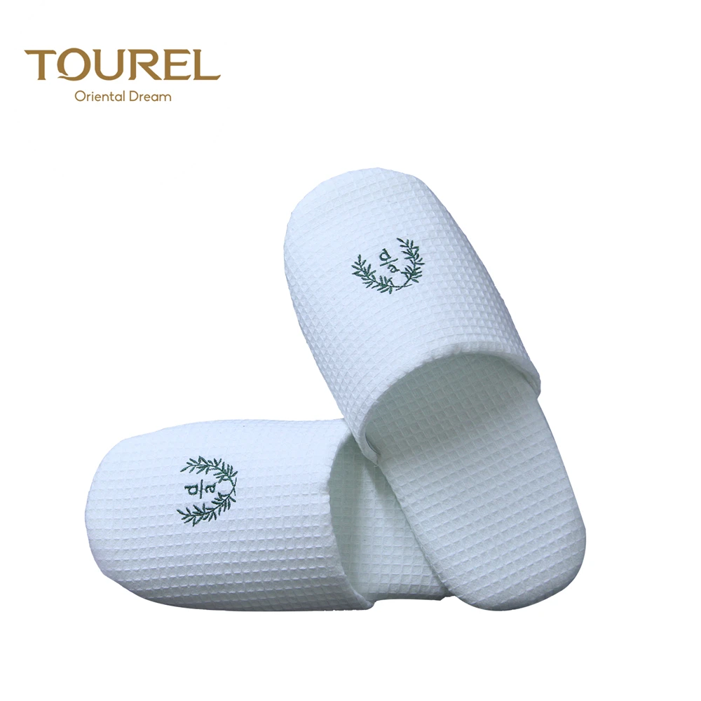 Chaussons en éponge gaufrée à bout fermé Tourel de qualité hôtelière premium avec logo brodé