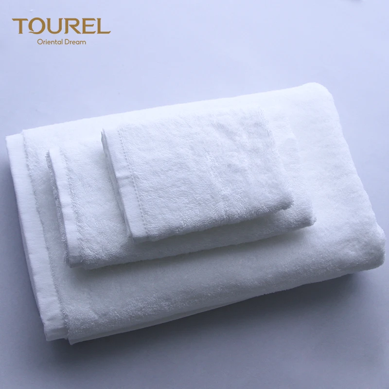Ensemble de serviettes d'hôtel du fabricant chinois, serviettes compressées blanches bon marché jetables à séchage rapide