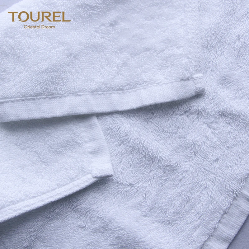Ensemble de serviettes d'hôtel du fabricant chinois, serviettes compressées blanches bon marché jetables à séchage rapide