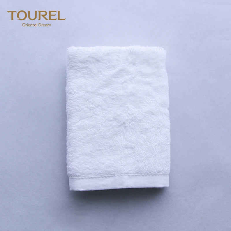 Ensemble de serviettes d'hôtel du fabricant chinois, serviettes compressées blanches bon marché jetables à séchage rapide