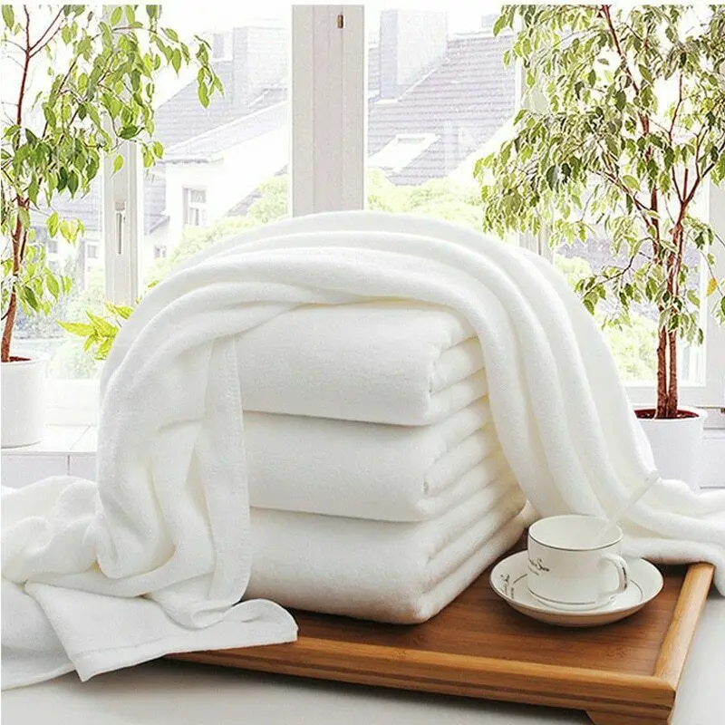 Toalla de baño de algodón 100% para hotel, lujosa, personalizada, barata, al por mayor, desechable, comprimida, tejida, egipcia, de 70x140 cm, blanca, lisa, de rizo, juego